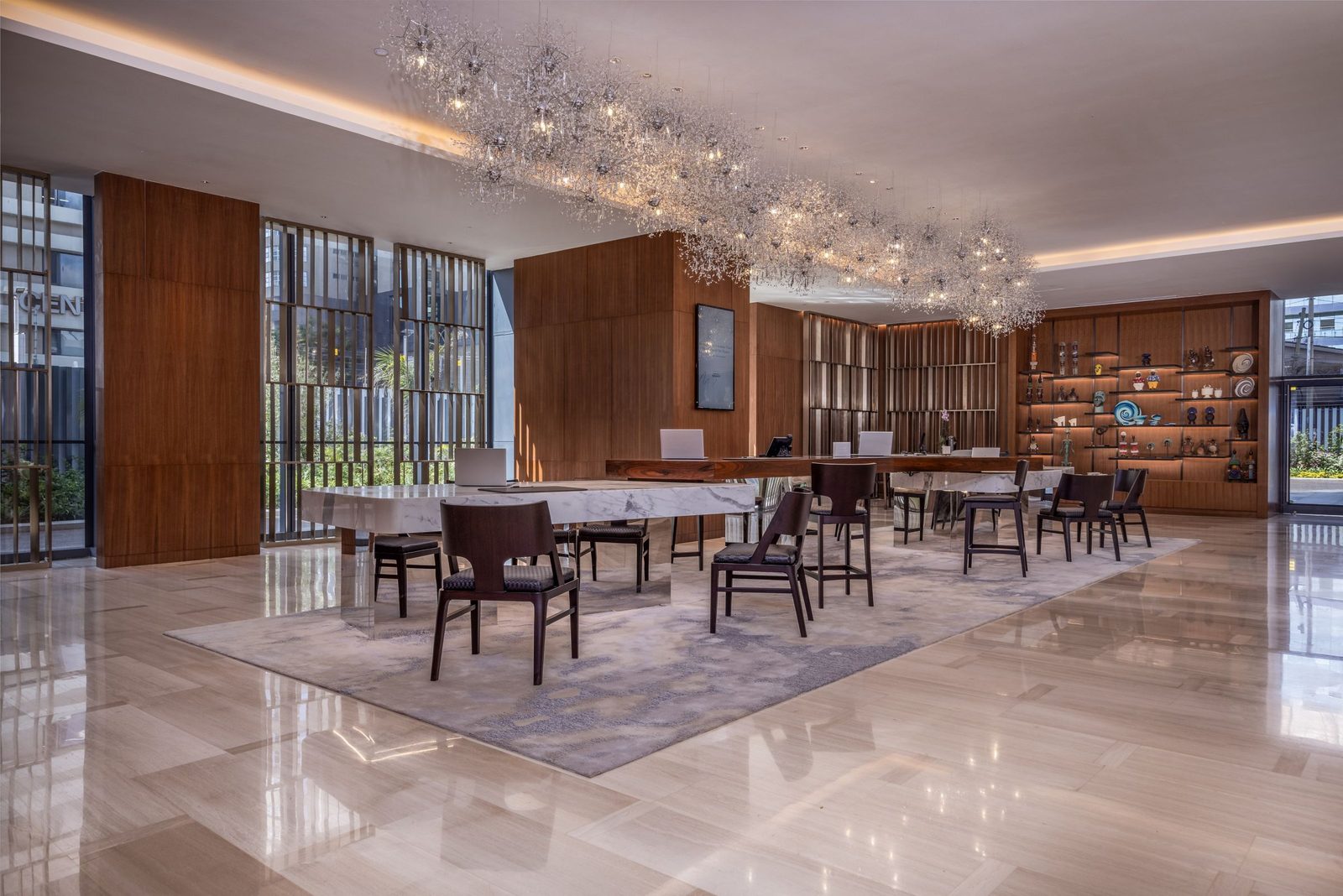 The check-in lobby in earth tones