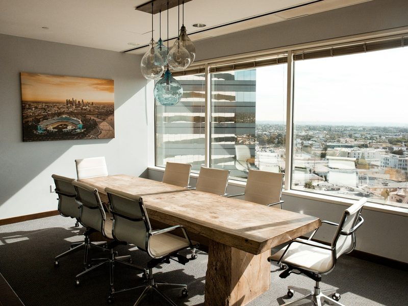 Beige wooden conference table