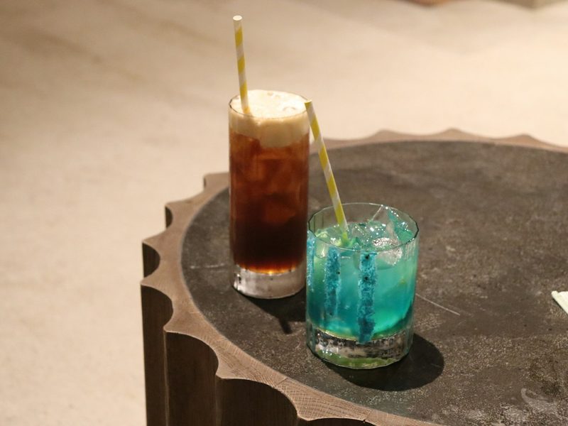Drinks on a table by the sea
