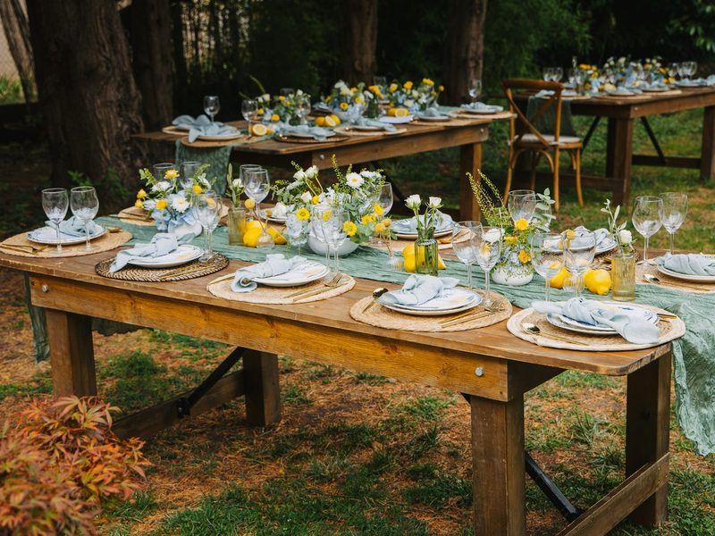 Outdoor tables set for a formal dining event