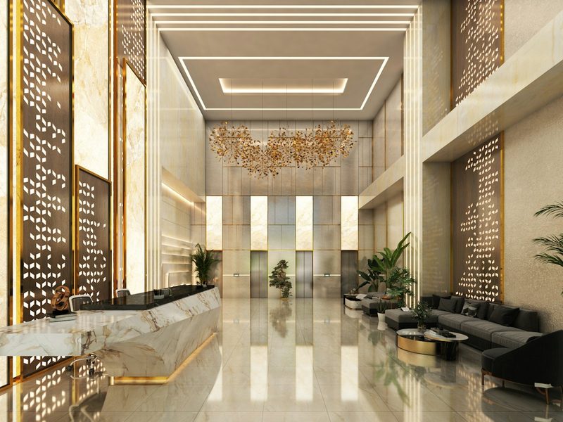 Modern hotel lobby with sleek reception desk and seating
